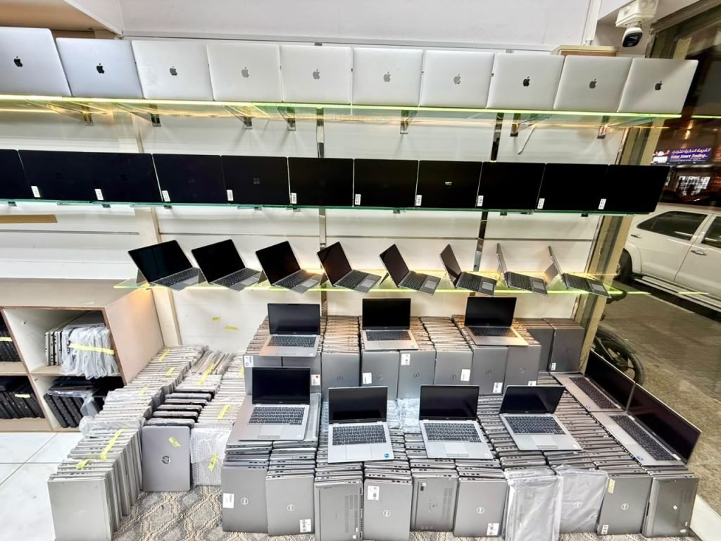 Renewed laptops on the Laptop Factory workshop floor in Sharjah