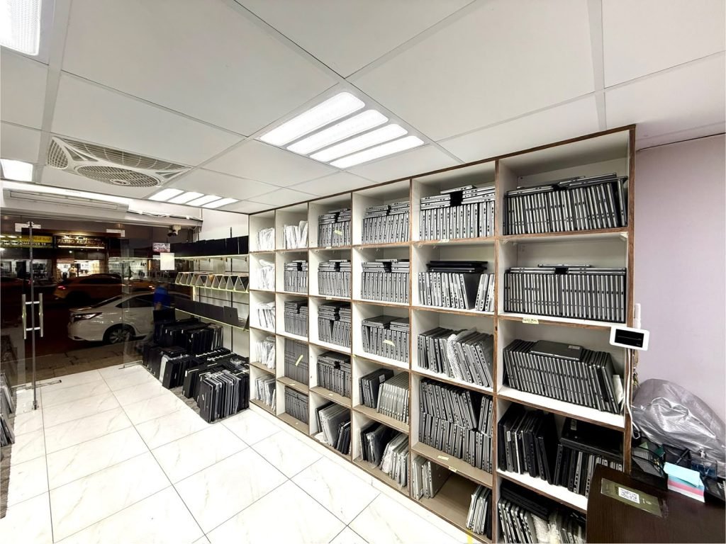 Renewed laptops on the Laptop Factory workshop floor in Sharjah